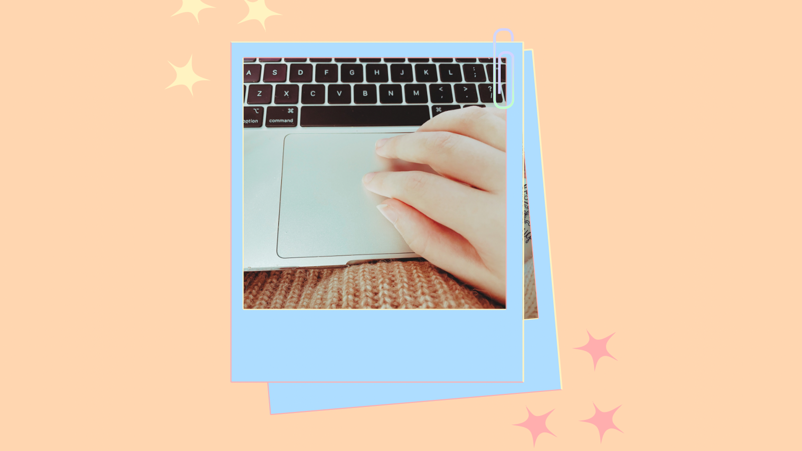 A cartoon style polaroid of Tig’s hand on a laptop keyboard. The background features a light orange setting with cartoon stars.